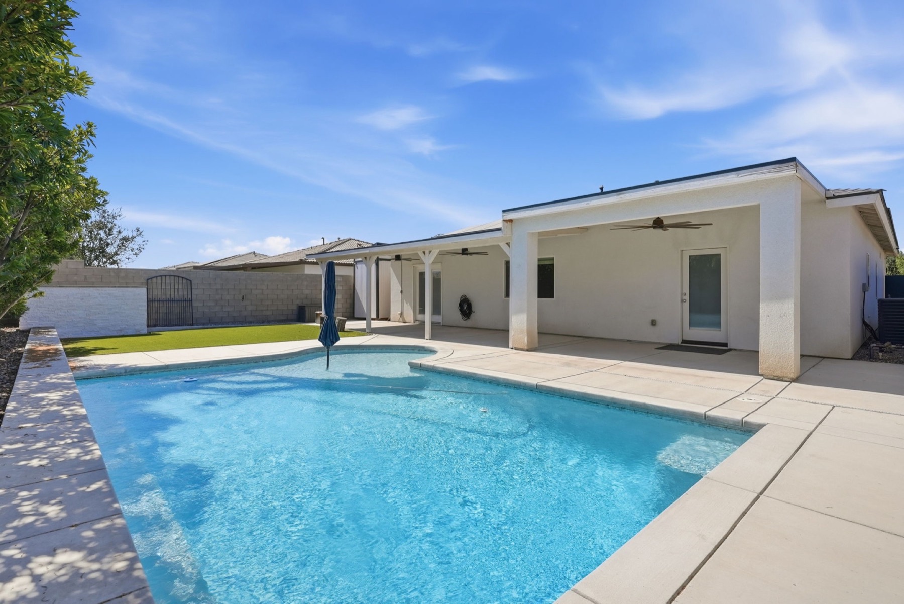 Bright backyard swimming pool