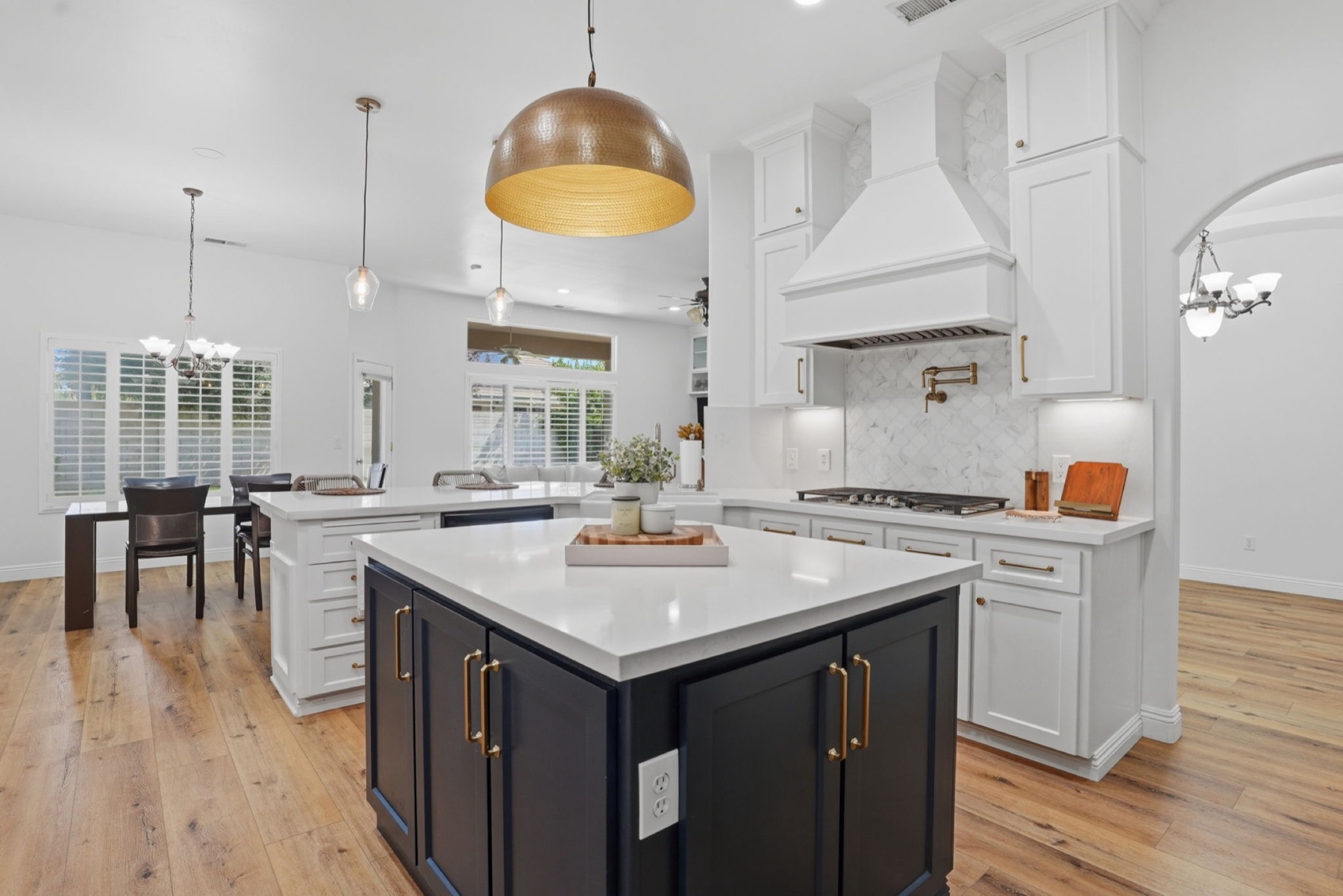 White designer kitchen with statement island